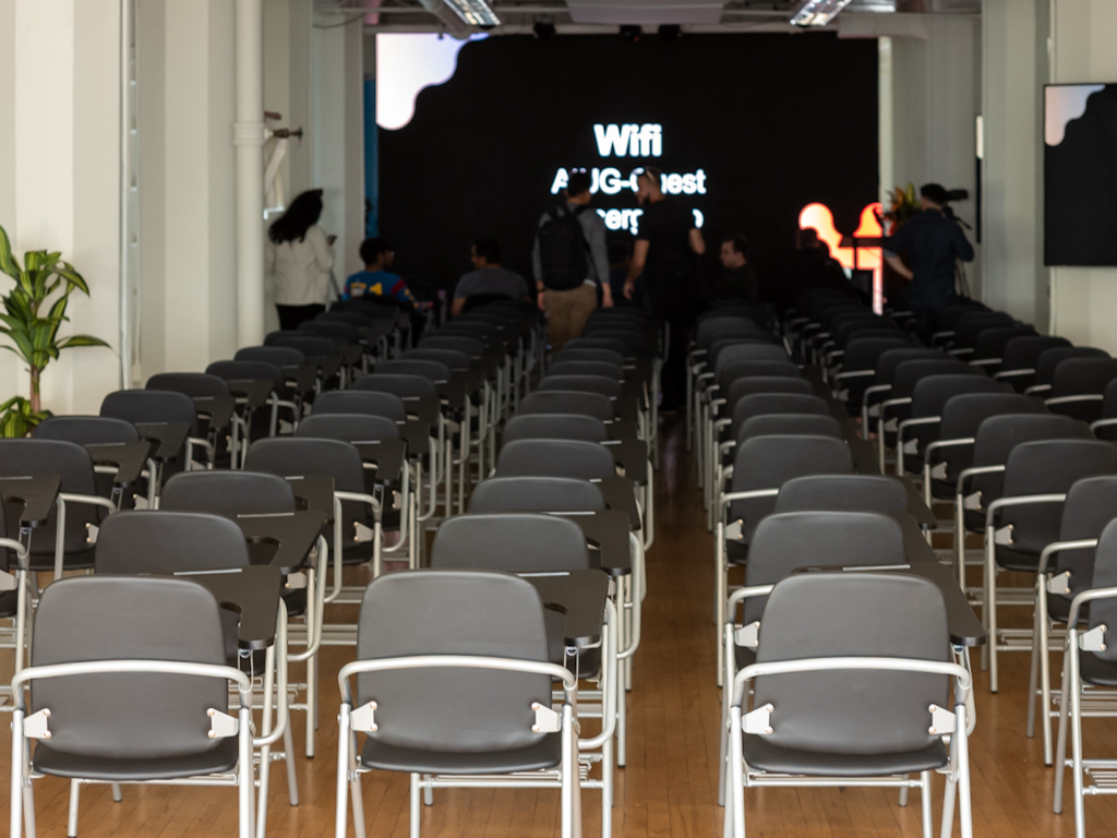 Digital Jungle main event room with stage and LED wall